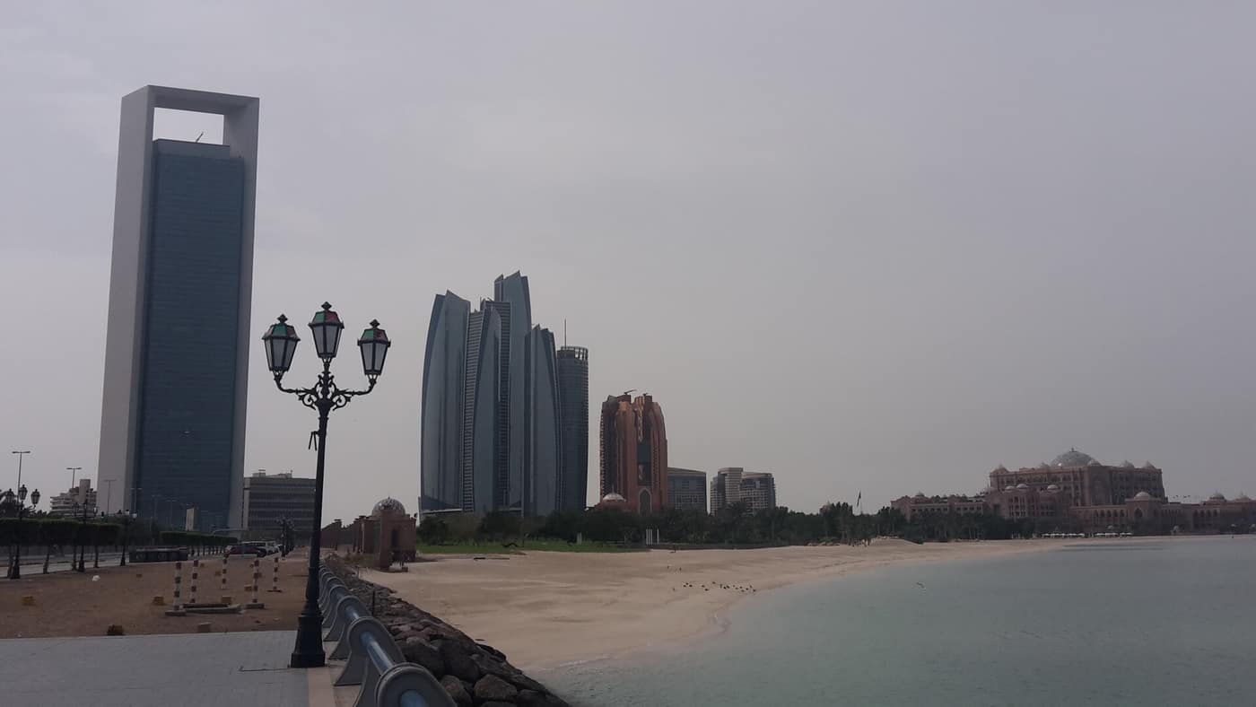 The Abu Dhabi corniche, with the Etihad Towers and Emirates Palace