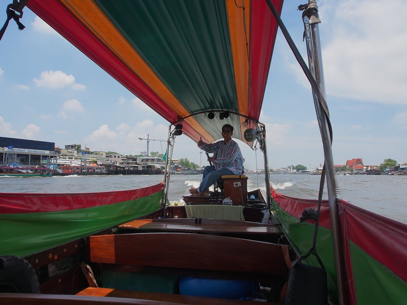 Wat Arun beside the Chao Phraya River in Bangkok
