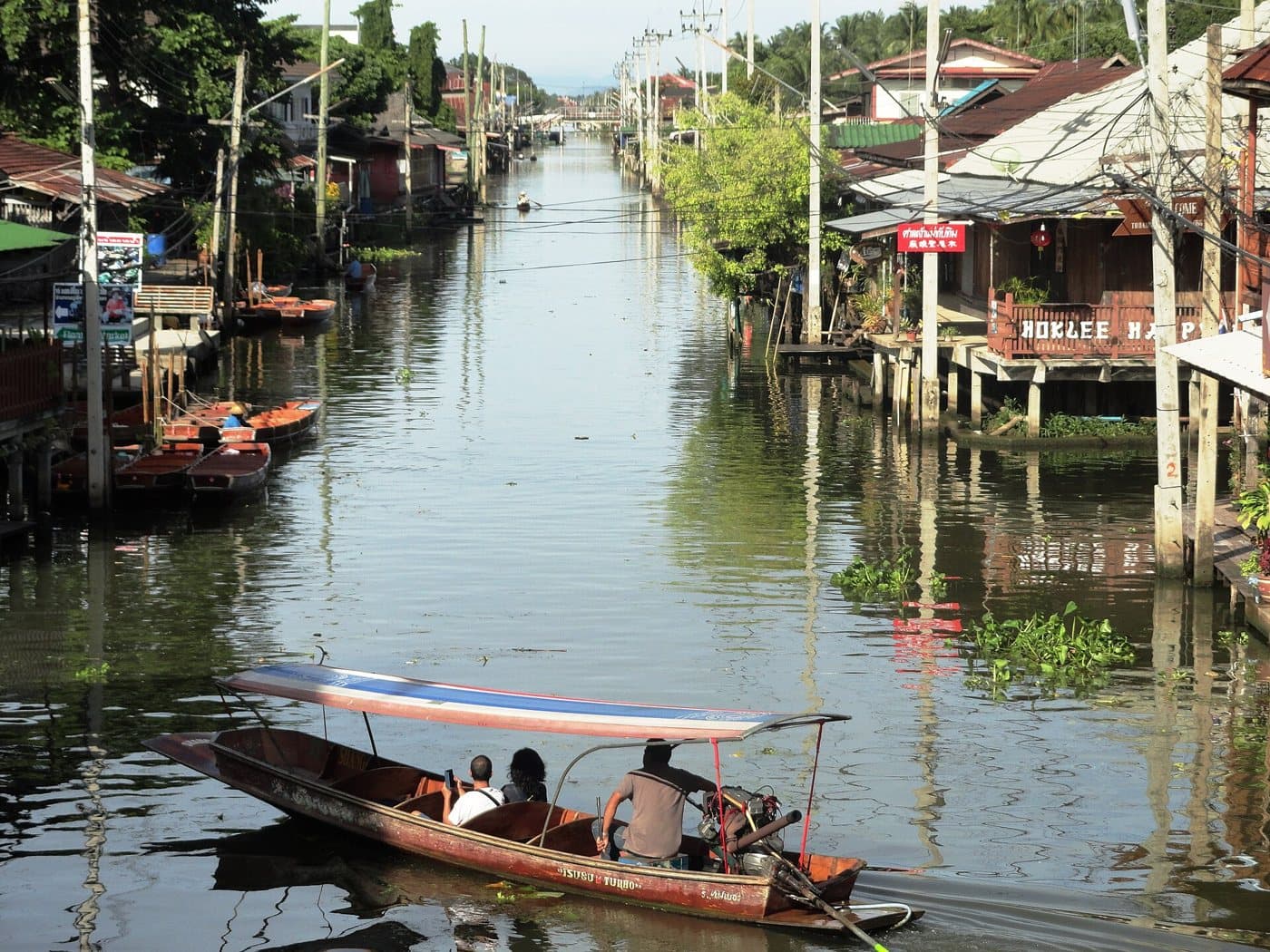 A long-tail boat on the canal at Damnoen Saduak floating market